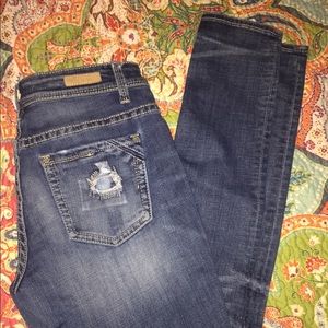 Buckle black skinny jeans